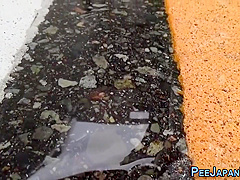 Japanese Hussy Pisses On The Street