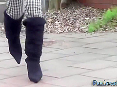 Japanese Hussy Pisses On The Street