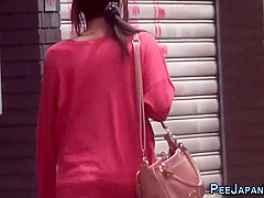 Japanese Hussy Pisses On The Street