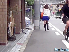 Japanese Hussy Pisses On The Street