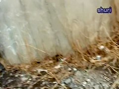 Japanese girl releases a golden shower in the public park