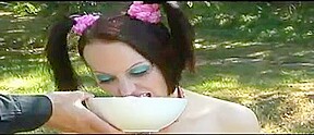 Kinky bitch eats food from the floor in fetish porn