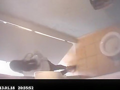 Long hair chick spied in public toilet peeing