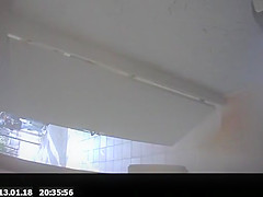 Long hair chick spied in public toilet peeing