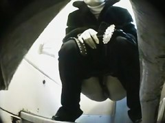 Long legged girl has pissed on the public toilet