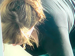 MILF Bends Over To Show Off Her Rack