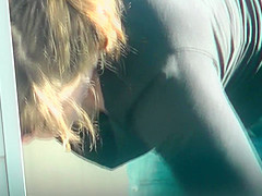 MILF Bends Over To Show Off Her Rack