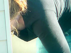 MILF Bends Over To Show Off Her Rack