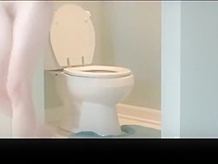 MILF caught naked in the toilet