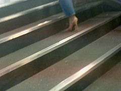 MILF in golden high heels