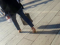 MILF in golden high heels