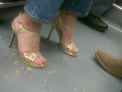 MILF in golden high heels