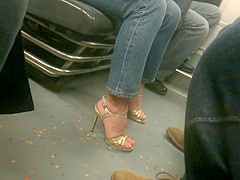 MILF in golden high heels