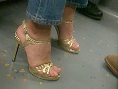 MILF in golden high heels
