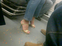 MILF in golden high heels