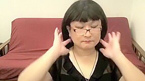 Mature cd with glasses toying her ass