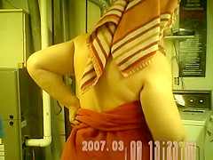 Mature chubby woman drying her body