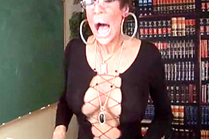 Mature masturbating shemale in action