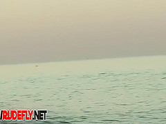 Milf Filmed At A Nudist Beach While Taking Off Her Top  Nice