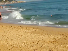 Naked blonde on a Nude beach  Masturbating and pissing 