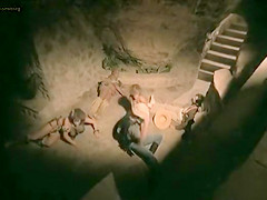 Naked cavegirl with perky tits in movie clip