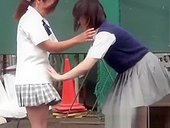 Naughty Japanese schoolgirls 18+ pissing in secret public place