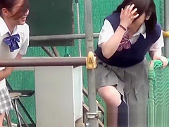 Naughty Japanese schoolgirls 18+ pissing in secret public place