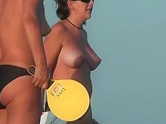 Nudist beach vid with a hot brunette