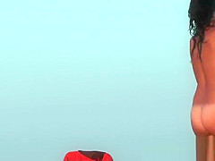 Nudist beach vid with a hot brunette