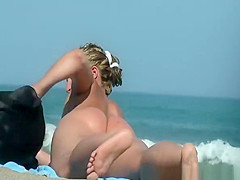 Nudist woman puts cream on her butt