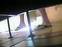 Pissing girl spied from above the wall