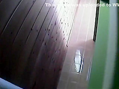 Pissing girl spied from above the wall