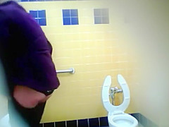 Pretty Mexican babe comes to take a piss