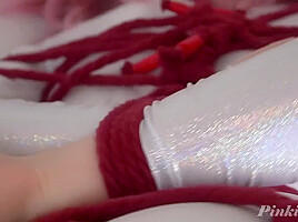 Rope Tied In Shiny Spandex Catsuit