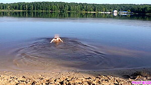 Sexy Girl Undresses And Swims Naked In Public Beach