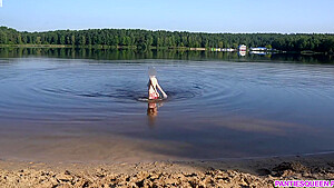 Sexy Girl Undresses And Swims Naked In Public Beach