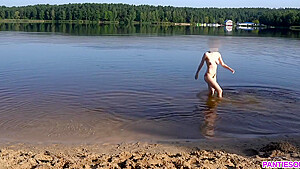 Sexy Girl Undresses And Swims Naked In Public Beach