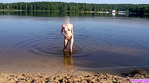 Sexy Girl Undresses And Swims Naked In Public Beach