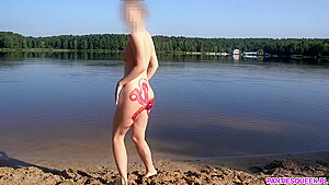 Sexy Girl Undresses And Swims Naked In Public Beach