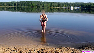 Sexy Girl Undresses And Swims Naked In Public Beach