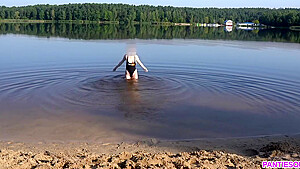 Sexy Girl Undresses And Swims Naked In Public Beach