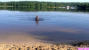 Sexy Girl Undresses And Swims Naked In Public Beach
