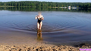 Sexy Girl Undresses And Swims Naked In Public Beach