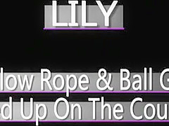 Sexy Lily tied up on a couch