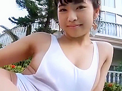 Sexy asian girl wearing heels in the pool 