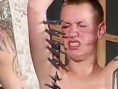 Sexy homosexual in a cool fetish scene