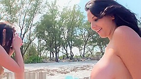 Sexy topless girls on the beach