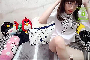 Sexy young Chinese teen 18+ shows off her flexibility with a vibrator in her butt