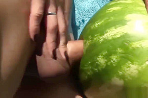 Shemale fucks a watermelon