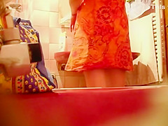 Spying a bent over wife in the bathroom